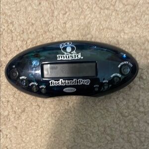 Vintage Radica 20 Questions. Rock & Pop electronic trivia